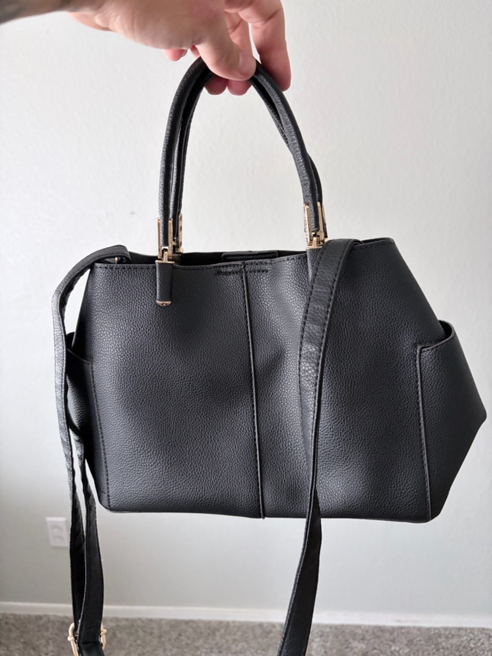 Elegant Black Pebbled Crossbody Satchel with Gold Accents